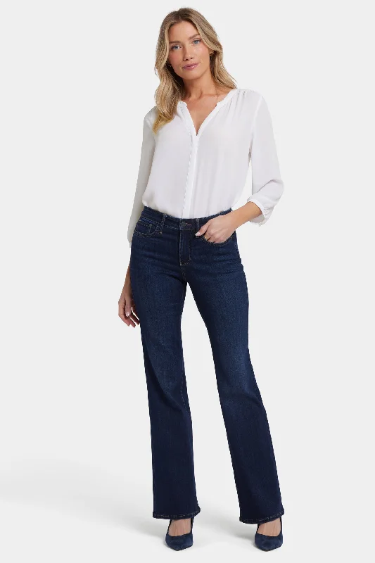 High - rise flare women jeans for a 70s - inspired lookAva Flared Jeans - River Bridge